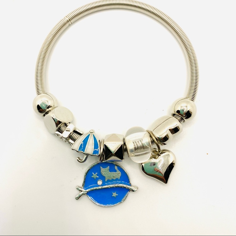 Bracelet Doggy on Silver tone wire. Won’t Tarnish or Stretch out.